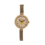 West End Watch Company 9ct gold ladies wristwatch, the signed gilt and white dial with Roman