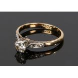 18 carat gold diamond set ring, the round cut diamond at approximately 0.40 carat, ring size L