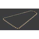 9 carat gold necklace, with triangular fan decoration, 4.5 grams