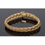 18 carat bracelet, with a rope design to the clasp end, 27.4 grams