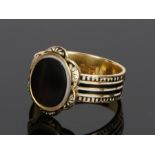 Victorian mourning ring, assayed for London 1871, with a banded agate head with white and black