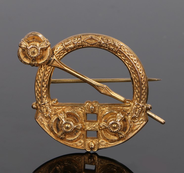 Irish Celtic design brooch, by Johnson of Dublin, in the style of a Celtic brooch in gilt metal,