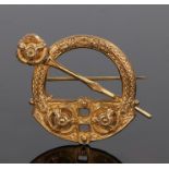 Irish Celtic design brooch, by Johnson of Dublin, in the style of a Celtic brooch in gilt metal,