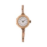 Ladies 9 carat gold wristwatch, the white enamel dial with black Arabic hours attached to the 9