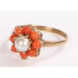 9 carat gold ring, with a pearl and coral effect surround