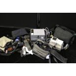 Panasonic NV-DS60 Camcorder, together with a flash, various other optical equipment, slide