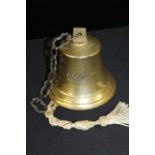 Brass ships bell, with hanging chain and rope pull