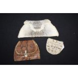 Three snake and alligator skin purses, the largest 22.5cm wide (3).