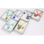 Collection of six boxed glass jewellery sets, in various designs, (6)