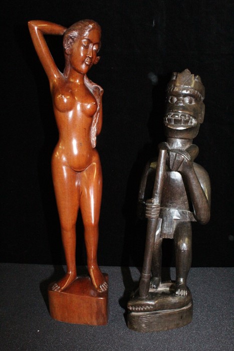 two Asian carved figures, to include Balinese carved figure of a naked lady, 42cm high, together