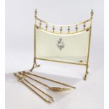 Victorian Adam style mirrored brass fire screen, with an arched finial top and mirror panel on