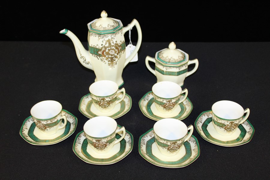 Meito China six piece coffee service, with the pot, cups and saucers and sugar bowl