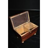 Regency style rosewood tea caddy, the gadrooned hinged lid opening to reveal two interior