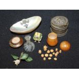 Mixed works of art, to include a miniature glass vase, a metal box, a shell, a treen pot and