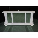 Victorian white painted over-mantel mirror. the carved pediment supported by two pilasters, with