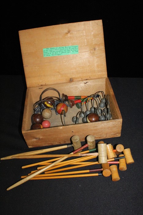 Table or parlour croquet set, to include mallets, balls and hoops, housed in a pine box