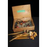 Table or parlour croquet set, to include mallets, balls and hoops, housed in a pine box