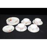 Royal Worcester harlequin part tea service, with floral spray decoration and gilt borders,