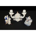 Porcelain, to include a candlestick with a central figure, a musican seated on a chair and an