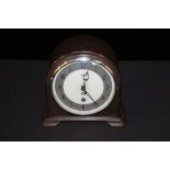 Smiths bakelite mantel clock, the signed dial with military broad arrow, the silvered chapter ring