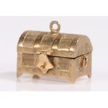 9 carat gold charm, in the form of a chest, 3.6 grams