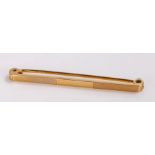 9 carat gold tie pin, with an engine turned bar, 2.1 grams