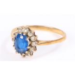 9 carat gold ring, with a central blue stone, ring size O