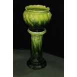Art Nouveau style Rex jardiniere and stand, the green sirled body with acanthus leaf abd scroll