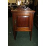 Edwardian mahogany pot cupboard, with shaped upstand to the back, panelled cupboard door, raised