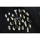 Collection of bottle stoppers/corks, in various designs in silver colour, (qty)