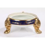 Noritake dish, with blue and gilt decoration, raised on three gilt paw feet, 17cm diameter