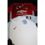 Nike England football shirt, size large, Adidas Manchester United football shirt, size medium,
