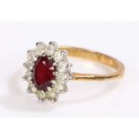 9 carat gold ring, with a red stone in flower head design, ring size Q