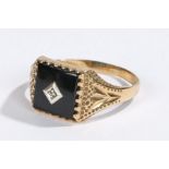 9 carat gold signet ring, with a stone set head, 2.7 grams