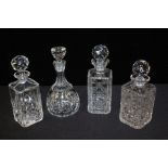 Four glass decanters, (4)