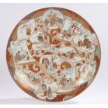 Japanese Meiji period Satsuma charger, decorated with figural panels in various scenes, six