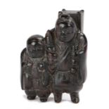 Japanese Meiji period netsuke, the wood netsuke depicting two standing figures with baskets to their