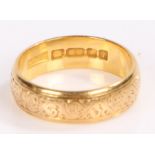 22 carat gold wedding band, with scroll decoration, 6.1 grams