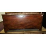 Dark stained pine blanket box, with hinged lid opening to reveal an interior lidded compartment,