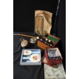 Works of art, to include a box, a tool sellers advert, three fishing reels and box sets, (qty)