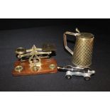 Brass postal scales and weights on a plinth base, brass jug and cover, pair of tortoiseshell