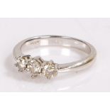 18 carat gold diamond ring, set with three diamonds to the head, 0.5 carat, ring size M