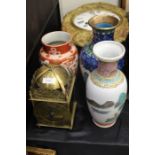 20th century brass lantern clock, cloisonne vase, two Oriental porcelain vases (4)