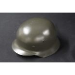Reproduction German Third Reich M.35 steel helmet, complete with liner and chin strap