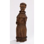 18th Century carving of Saint Francis of Assisi, the standing figure with traces of the original