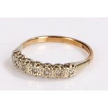 9 carat gold ring, set with a row of stones, ring size M