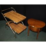 Mid 20th Century Amorco walnut veneered sewing table, the hinged lid opening to reveal a puce silk