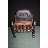 Cast iron fire basket, the arched back with raised lion decoration, 41.5cm wide