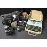 Camera's to include a Zenit, box brownie, another camera, camera bag, also together with a