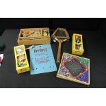 Two boxed Pelham puppets, a tennis racket, a game and a boxed Fit-Bits